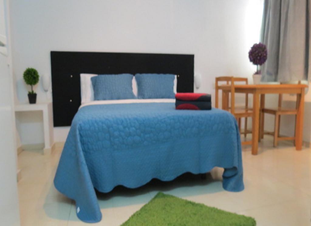 Comet Suites Almona Granada Room photo